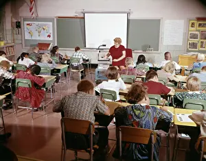 Schoolrooms: 1960s Teacher With Class In Schoolroom