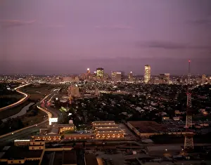 Sprawl: 1960s TWILIGHT EVENING ELEVATED VIEW OF SKYLINE