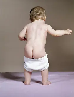 Plumbers: 1960s Back View Of Baby With Falling