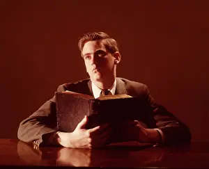 Bibles: 1960s Young Man Looking Upward