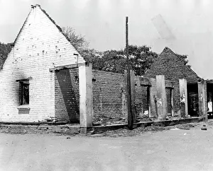 Headquaters: 1961 - War Without Guns - The fire-destroyed remnants