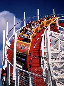 Centrifugal: 1970s 1980s ROLLER COASTER COMING AROUND DOWNHILL