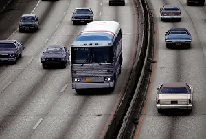 Busses: 1970s Cars And Bus On Divided