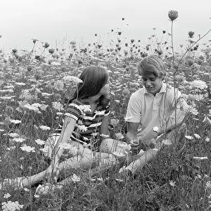 Romantics: 1970s Couple Sitting & Talking