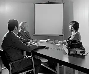Audiovisual: 1970s THREE EXECUTIVE BUSINESSMEN CONFERENCE
