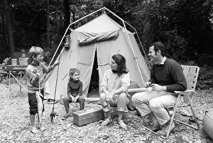 Roughing: 1970s Family Of Four Sitting In