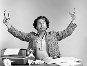Melodramatic: 1970s Man At Desk Typewriter Crumpled