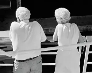Retiree: 1970s Rear View Of Elderly Couple