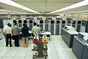 Mainframe: 1970s Small Group of Men Technicians in Mainframe Compute