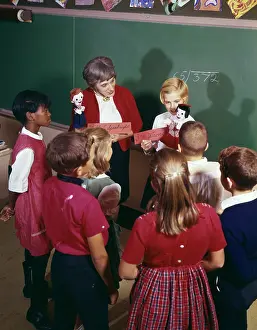 Schoolrooms: 1970s Teacher And Student Showing