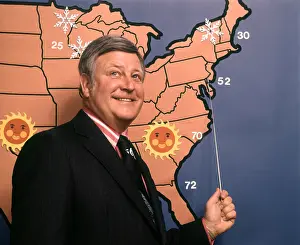 Weatherman: 1970s Television Weatherman Reporting Pointing to Eastern