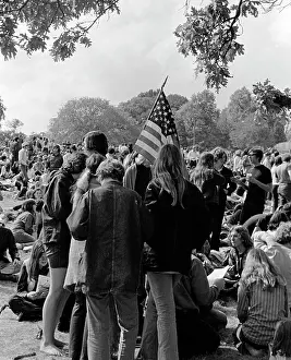 Backview: 1970s Back View Of Crowd Of Young