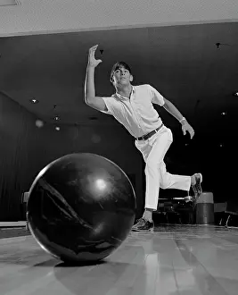 Tenpin: 1970s YOUNG MAN HAVING JUST THROWN A BOWLING