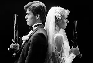 Duelling: 1980s Bride And Groom Back To