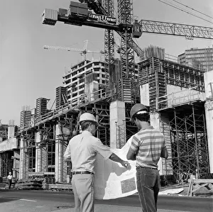 Planner: 1980s Rear View Of Two Hard Hat