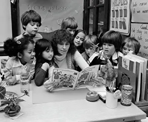 Schoolrooms: 1980s Teacher Reading Book To