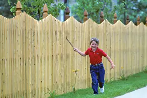 Bar007: 1990s Energetic Boy Dragging Stick along a