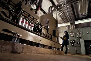 Generators: 1990s woman technician maintaining emergency