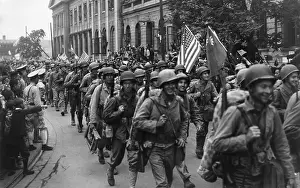 East Asian: 1st Div. U.S. Marines were greeted by crowds of