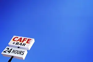 Snacks: 24 Hours Cafe and Bar Sign Low Angle looking Up