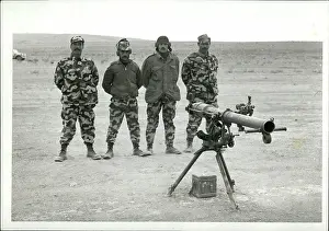 P.l.o: 4 members of the P.L.O. ready to fire with the
