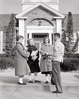 Loafers: 4 Teenagers Standing Talking in Front of School