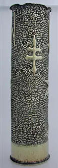 Embossing: 76 mm shellcase with an Art Deco design of floral embossing