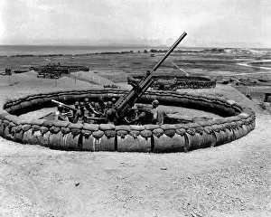 90mm: 90mm anti-aircraft gun emplacement with crew in