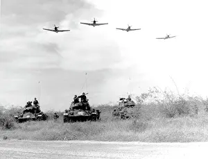 1960 1969: A-1H aircraft make a low level pass over Vietnamese