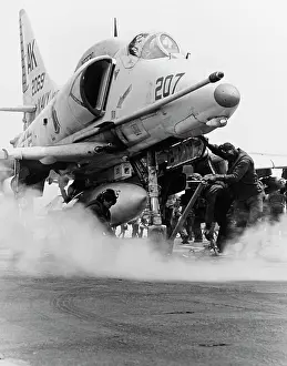 Catapult: An A-4F Skyhawk on the steam catapult aboard