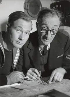 Riverboat: A. P. Herbert on a riverboat plotting a route with the crew