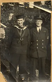 Humourist: A. P. Herbert with young lad (son?) in Naval attire