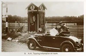 Patrolman: AA Touring Booth - Patrolman helps lady with a map