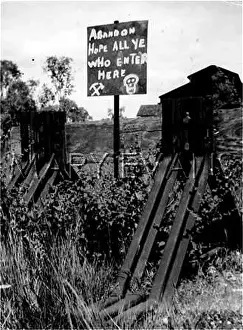 Forboding: ABANDON HOPE ROAD SIGN