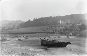 Riverbed: Abandoned Boats by the Shore