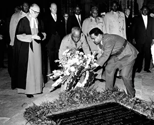 Unkown: Abboud lays on grave of unknow warrior