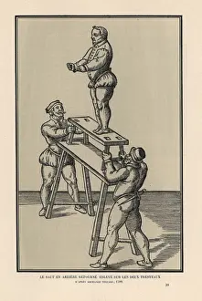 Trestle: Acrobat performing a backward somersault on two trestles