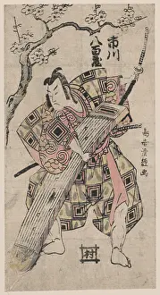 Koto: The actor Ichikawa Yaozo holding a koto