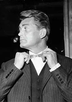 Marais: Actor Jean Marais fixing his bowtie
