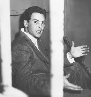 1177: Actor John Agar, protests photographers taking