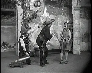 Lupino: The Actor Lupino Lane Lining Up a Small Cannon
