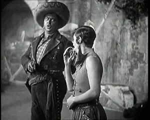 Lupino: The Actor Lupino Lane Lining Up a Small Cannon