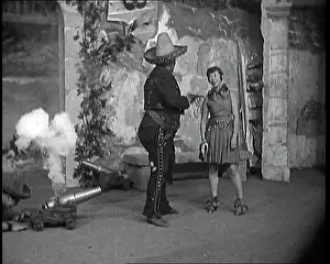 Lupino: The Actor Lupino Lane Lining Up a Small Cannon