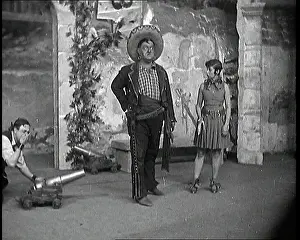 Lupino: The Actor Lupino Lane Lining Up a Small Cannon