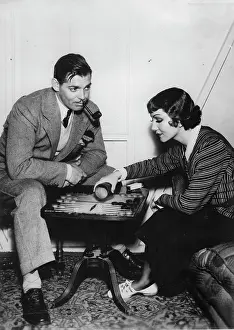 Backgammon: The actors Clark Gable and Claudette