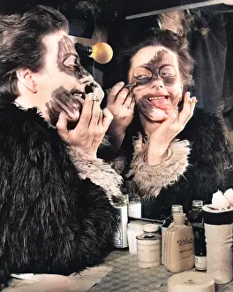 Panto: Actress Freda Wyn doing cat makeup for a pantomime