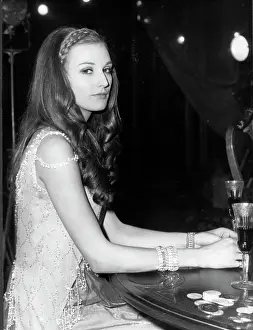 Marika: Actress Marika Green sitting at a party