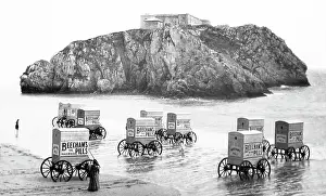 Tenby: Advertising Beecham's Pills - bathing machines, Tenby, Wales