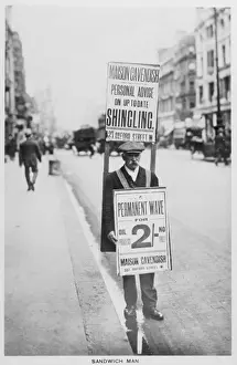 Advertise: An advertisement board man on the streets of London