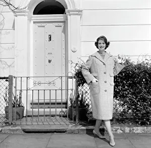 950s: Advertisement for Burberry overcoats